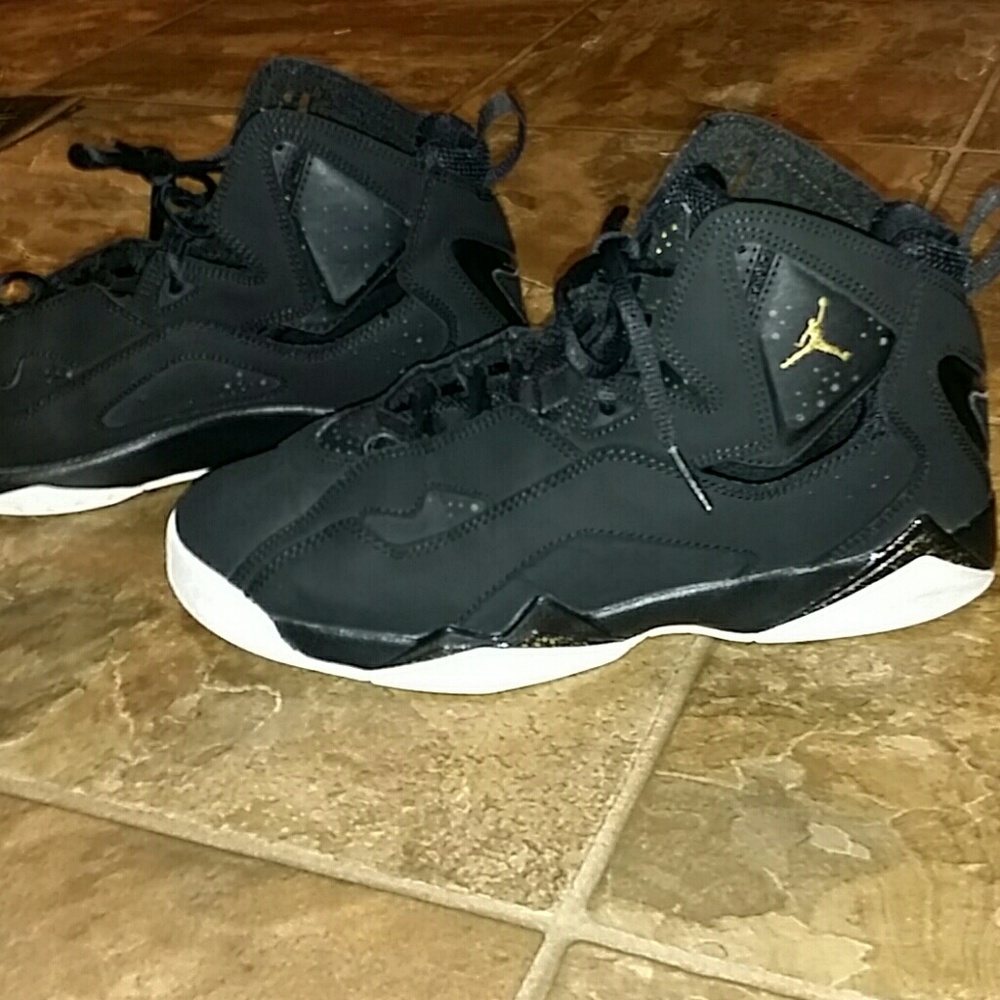 Black and gold True Flight nike jordan shoes